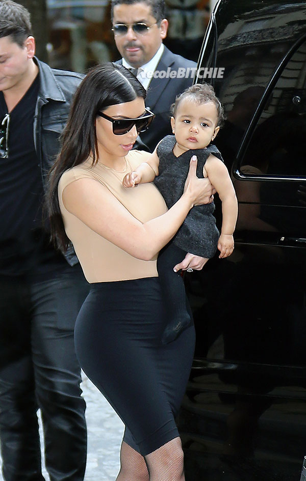 Kim Kardashian goes for a walk with her baby daughter North West