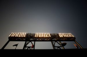 Low angle view of illuminated stadium lights, a Baseball Park, San Francisco, CA.