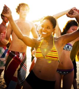 Young People Enjoying a Summer Beach Party.