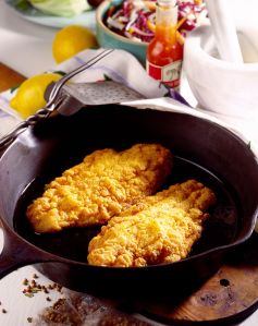 Fried catfish in skillet