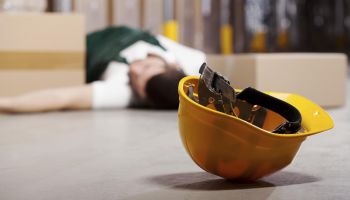 Dangerous accident in warehouse during work - wounded worker
