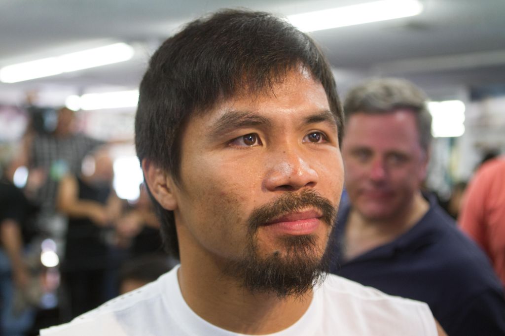 World champion boxer Manny Pacquiao open workout before Bradley fight.