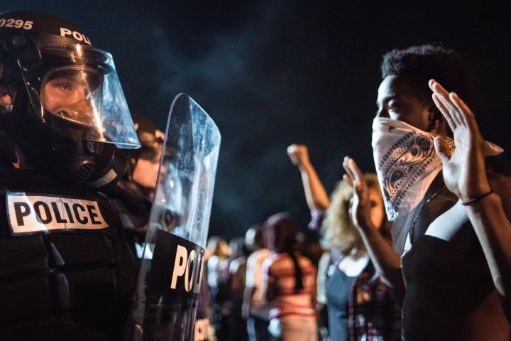 Police Officers Face Off with Protestors on I-85 in Charlotte