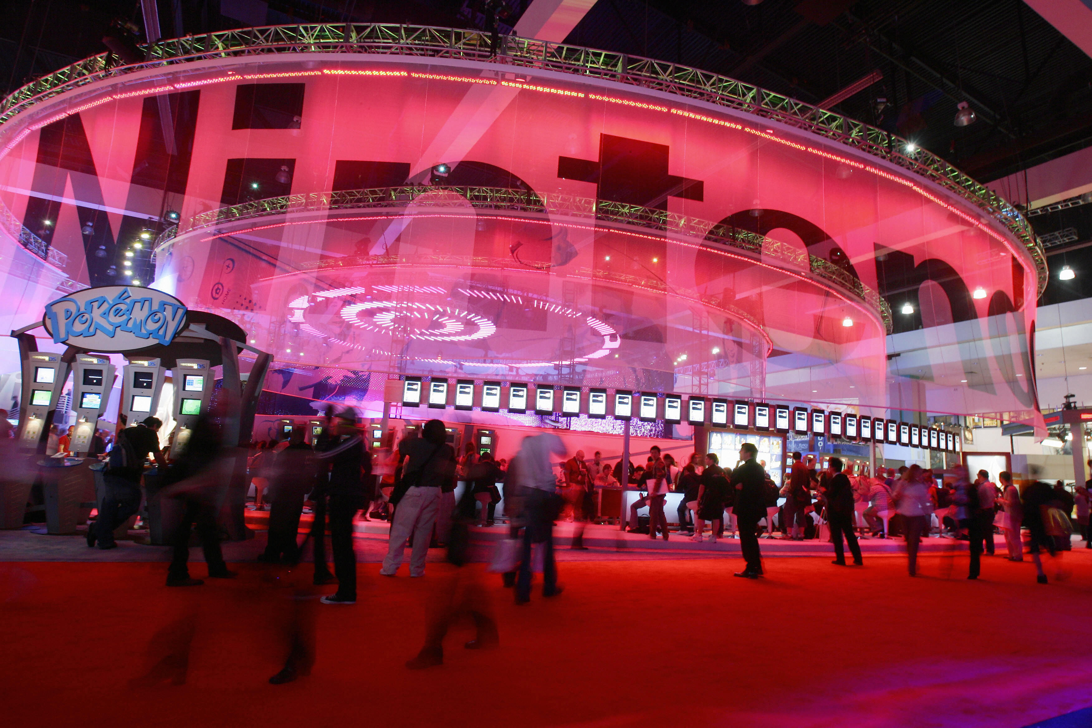 Visitors walk past of the Nintendo area