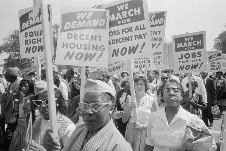 Protesters Holding Signs