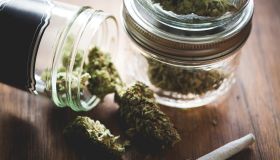Marijuana in a jar. Cannabis joint. Medical or recreative