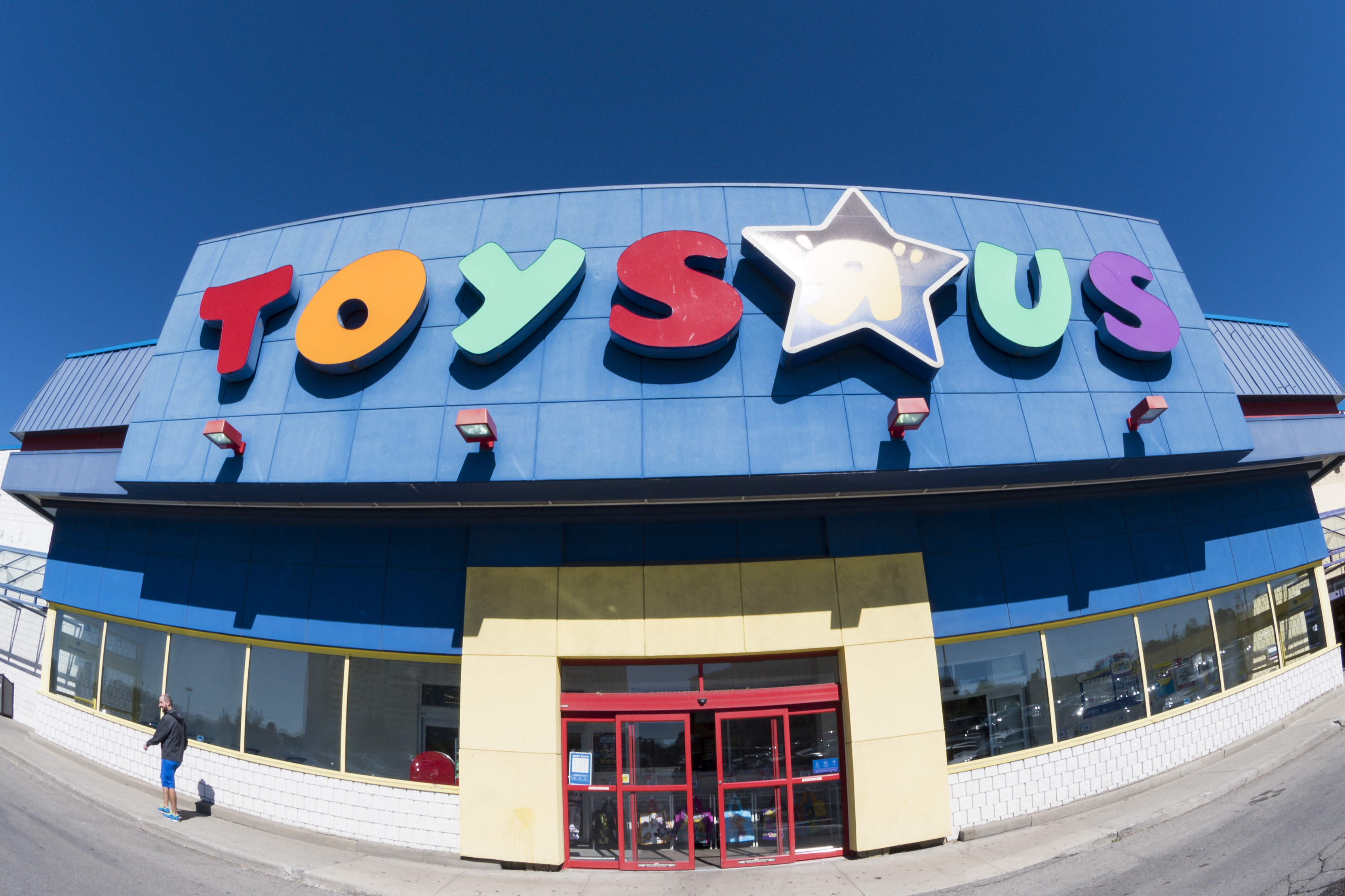 Toys R Us store facade in daytime. Toys 'R' Us, Inc. is an...