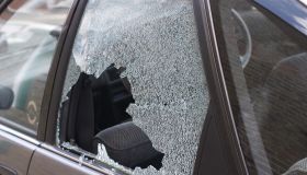 Thief broken glass in car window