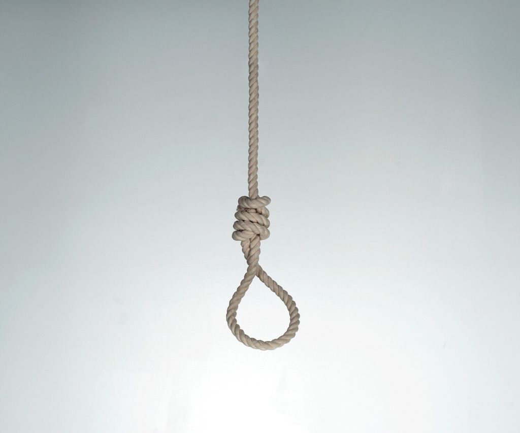 Low Angle View Of Noose Against White Background