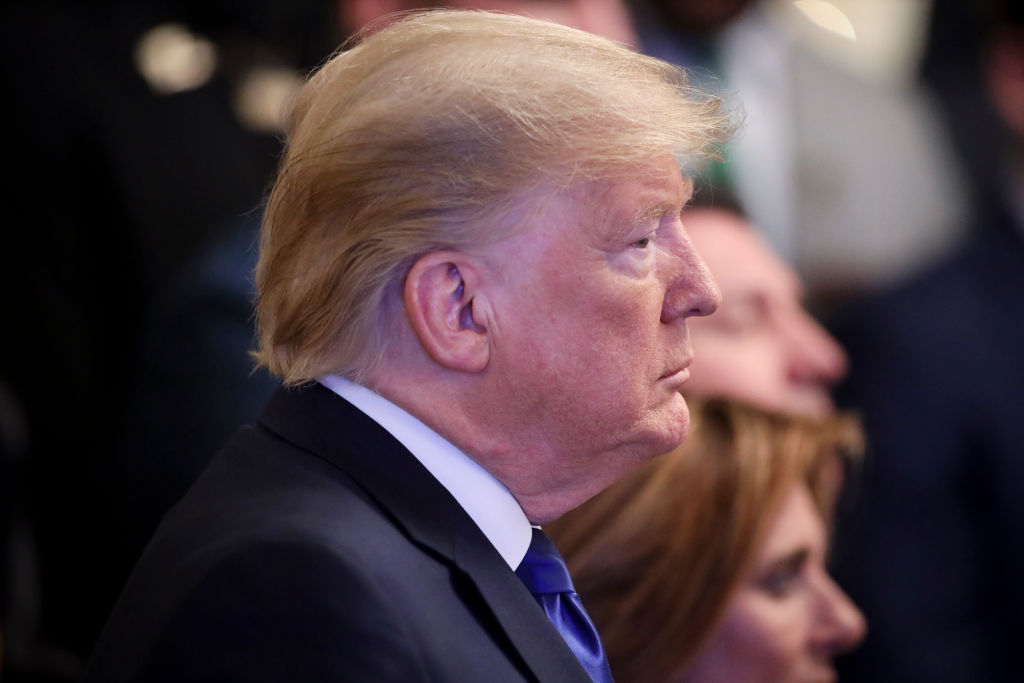 WASHINGTON, DC - JANUARY 17: President Donald Trump listens as