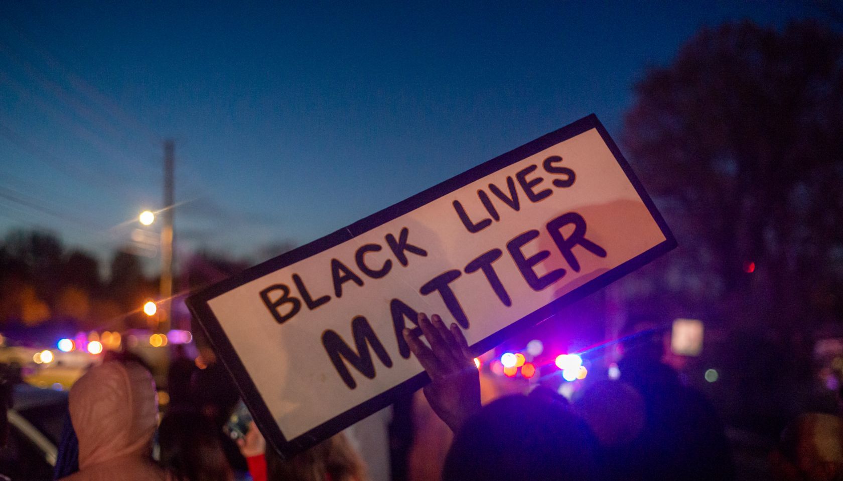 Protesters gather for Sean Reed