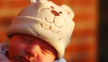One Week Old Baby in a Hat