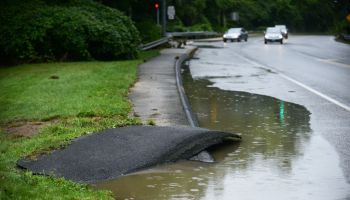 BETHESDA, MD - JULY 8: Parts of the sidewalk were washed away