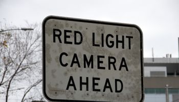 'Red light camera' traffic warning sign