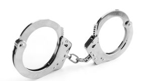 Handcuffs on white background