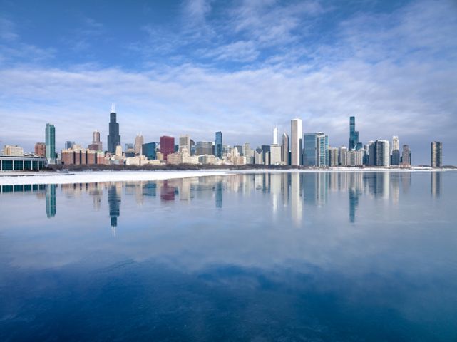 Chicago city Skyline and frozen Lake Michigan in winter, Illinois, USA