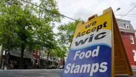 A sign indicating a bodega accepts WIC and food stamps stands at the corner of 6th and Bingaman streets. Photo by Bill Uhrich 4/27/2010
