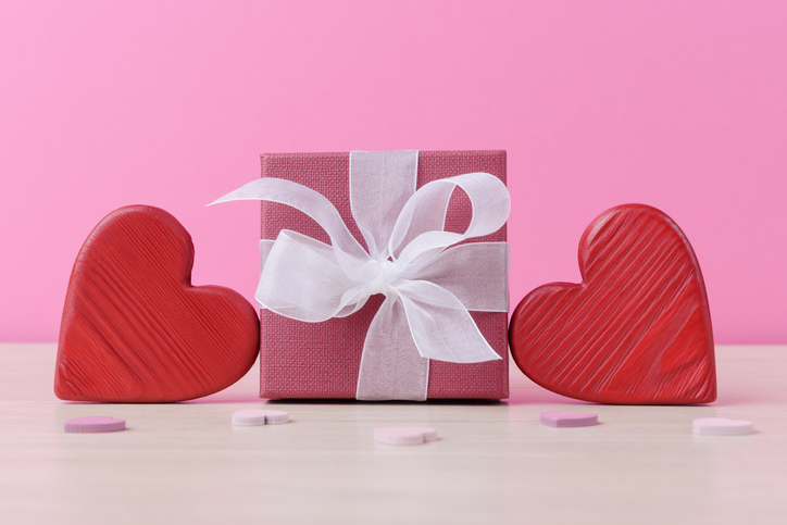 Gift box and decorative Valentines hearts. Valentineâs day greeting concept