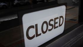 Closed sign at a business door