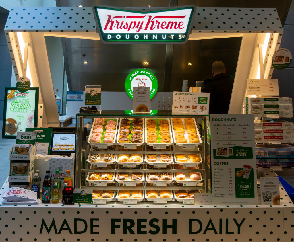 Krispy Kreme doughnuts stall in Buttermarket shopping center, Ipswich, Suffolk, England, UK