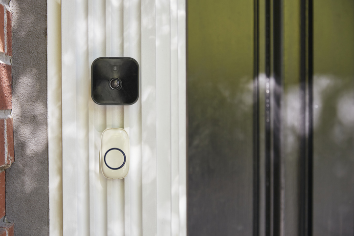 Straight on shot of a smart home video doorbell.