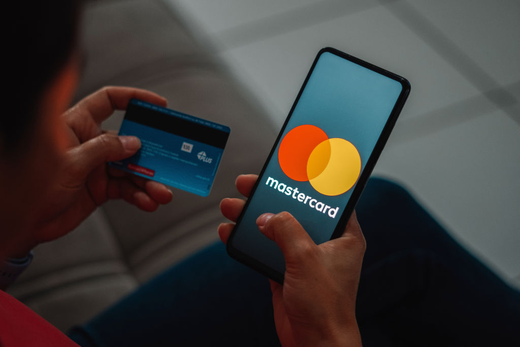 In this photo illustration, the Mastercard logo is displayed...