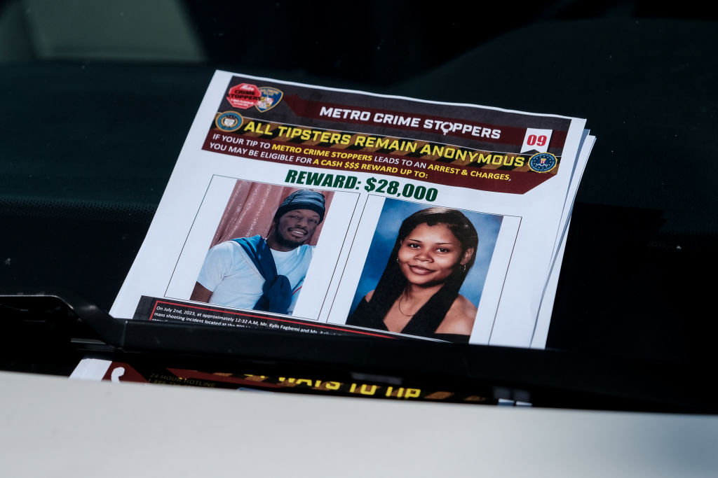 BALTIMORE, MARYLAND - JULY 3: A reward poster is seen on a car