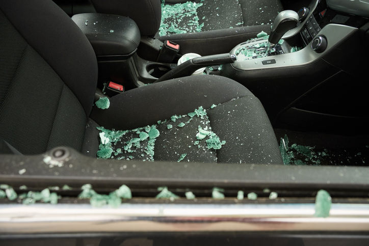 Shattered glass of the window of a car after a break in