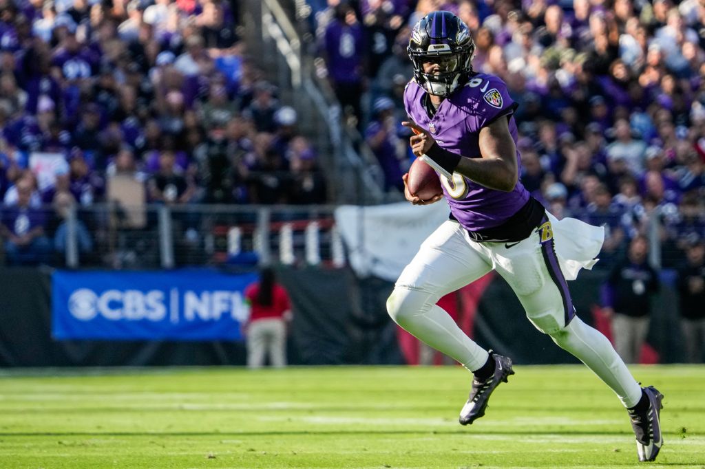 Baltimore Ravens quarterback Lamar Jackson (8) runs down the field during the second quarter against the Seattle Seahawks at M&T Bank Stadium on Sunday, Nov. 5, 2023.
