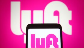 In this photo illustration the Lyft logo of an US...