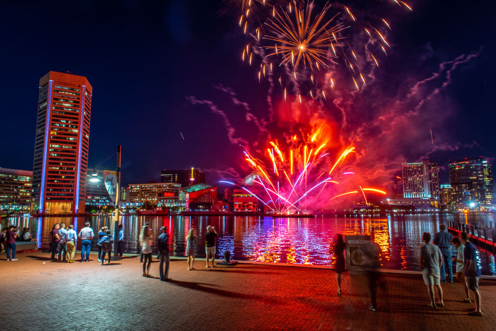 Colorful fireworks light up the night sky over Baltimore's inner harbor, Baltimore, Maryland.