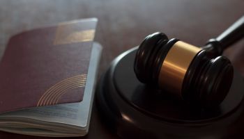 Passport and Judge's gavel