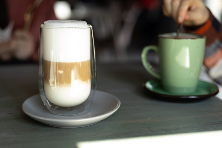 Coffee Latte In A Transparent Glass With White Foam