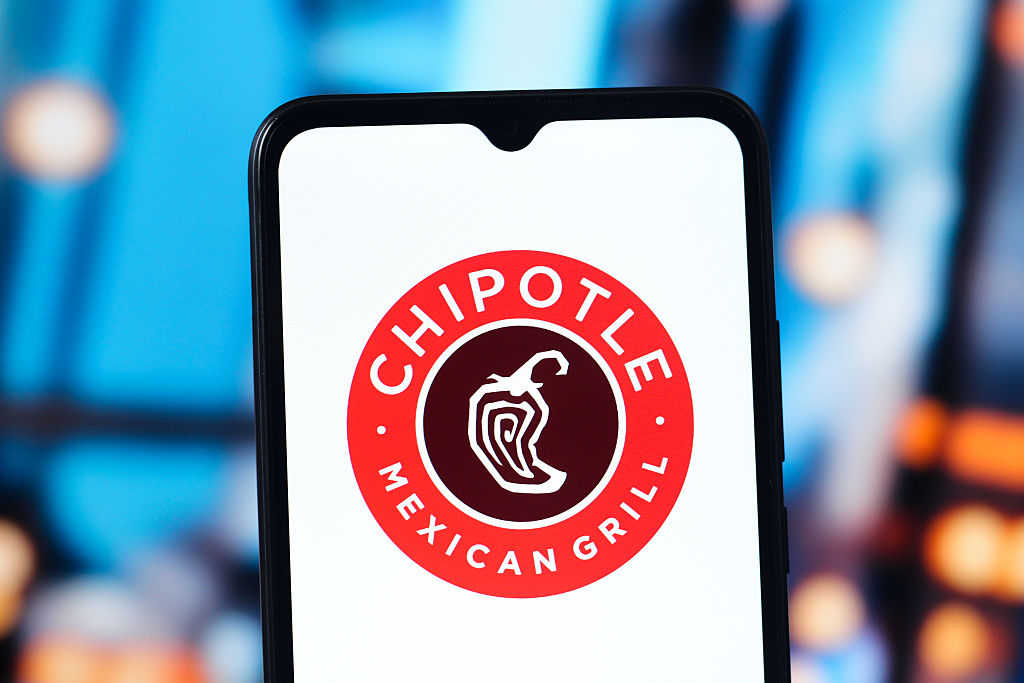 In this photo illustration, the Chipotle Mexican Grill logo...