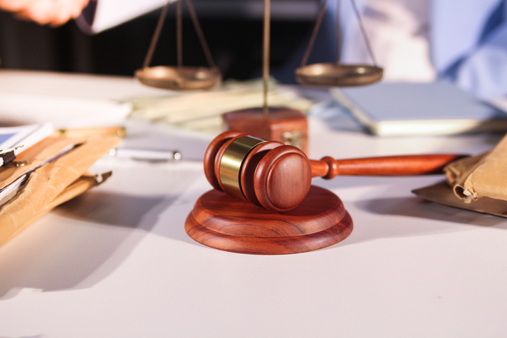Consultation and conference of professional businesswoman and Male lawyers working and discussion having at law firm in office. Concepts of law, Judge gavel with scales of justice