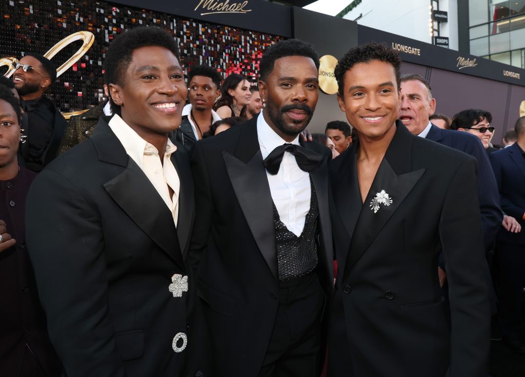 Three well-dressed Black men, including actor Colman Domingo, attend the Los Angeles premiere of the film "Michael" at the Dolby Theatre.