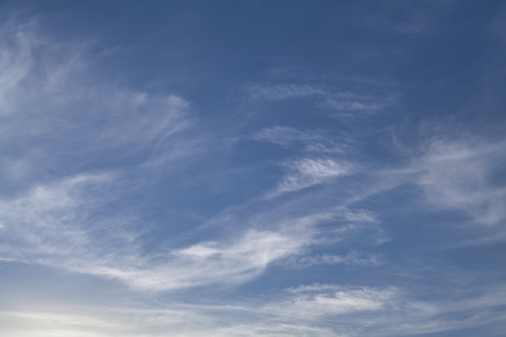 White Wispy Clouds in Blue Sky